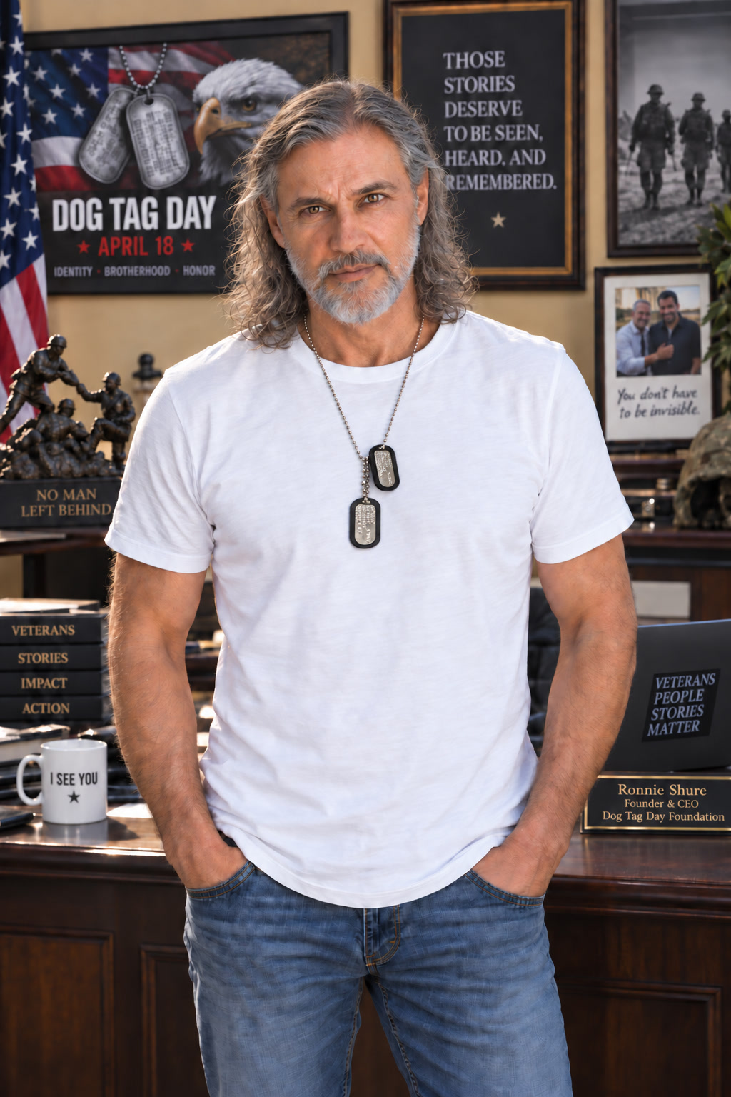Ronnie Shure standing in a white T-shirt wearing his dog tags